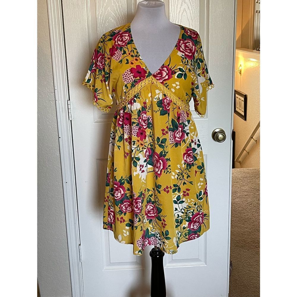 Yellow floral mini dress.